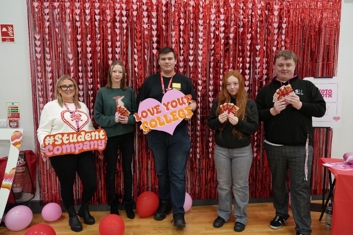 Picture of staff and students at a love your college event